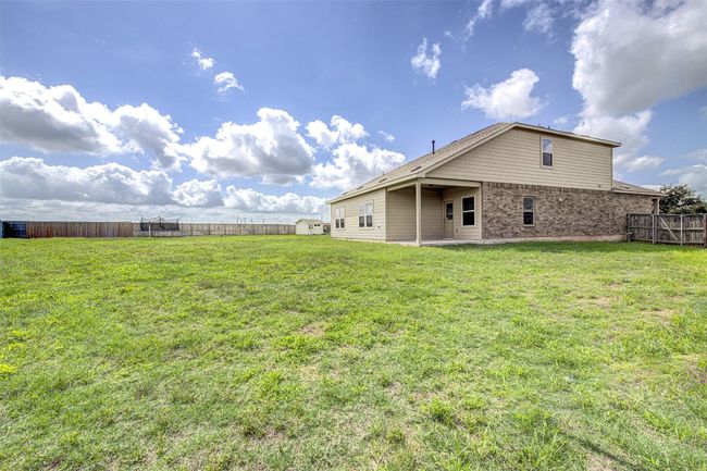 View of yard featuring a patio area | Image 28