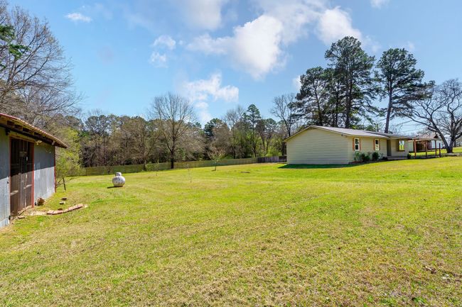 View of yard featuring fence | Image 9