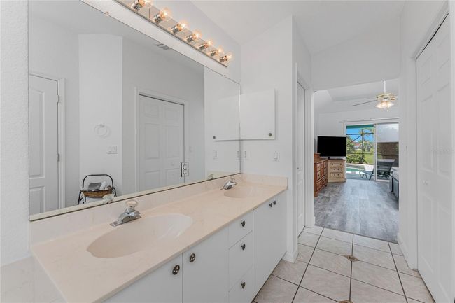 Primary bath has a double basin vanity - room for both of your toothbrushes! | Image 26