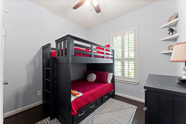 Bedroom 2 at the front of the home and shares the game room and secondary bathroom. | Image 15