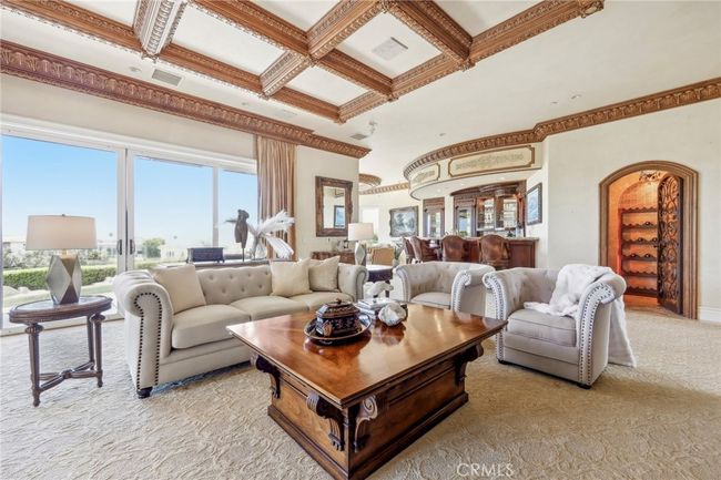 The Family Room is gorgeous and leads to the wine room and bar area/sitting room. | Image 15