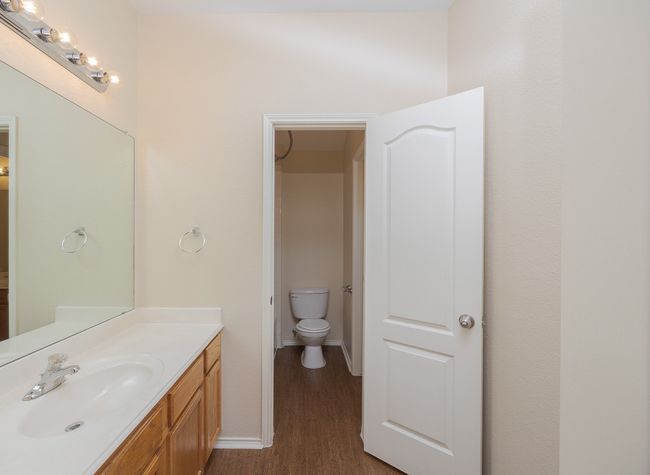 Bathroom featuring wood finished floors and vanity | Image 27