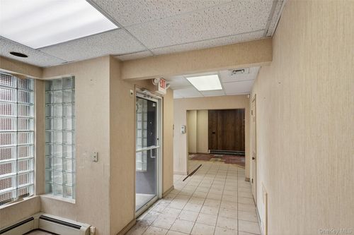 69 N Ocean Ave, Patchogue, NY, 11772-2003 | Card Image