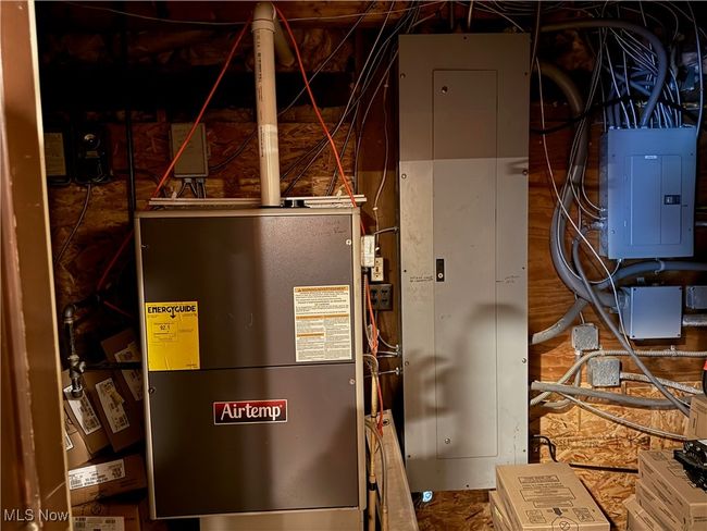 Utility room featuring electric panel | Image 11