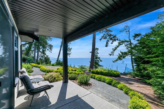 View of patio / terrace with a water view | Image 20