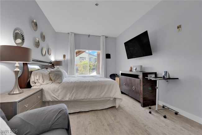 Bedroom featuring wood finished floors and baseboards | Image 29