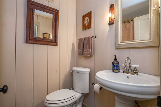 first floor bath, next to den and laundry area | Image 24
