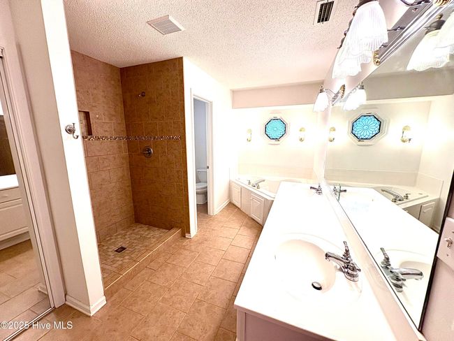 Dual Sinks, tub, walk-in shower, walk-in closet | Image 16