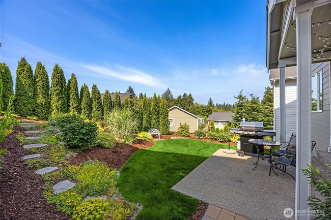 Backyard and covered patio | Image 10