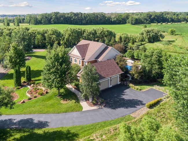 Home is on a one and a half acre lot, at the end of a cul-de-sac and surrounded by wetlands. | Image 82