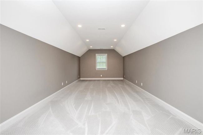 Bonus room featuring baseboards, recessed lighting, light carpet, and lofted ceiling | Image 28