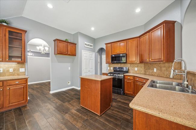 Spacious Kitchen with Cozy Breakfast Nook | Image 13