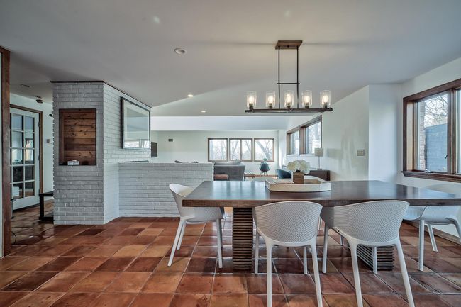 Dining area featuring recessed lighting and brick wall | Image 8