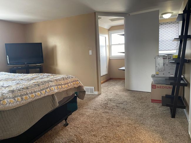 upper level primary bedroom | Image 10