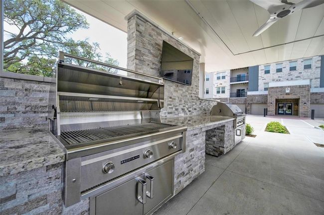 Community outdoor grill. | Image 29