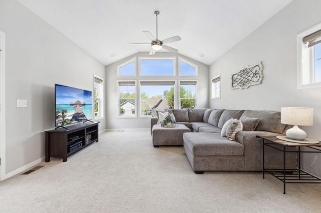 As well as vaulted ceilings & large, treated, windows- making for an abundance of natural lighting! | Image 5