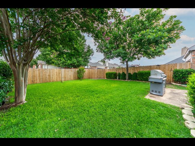 View of yard featuring a fenced backyard | Image 7
