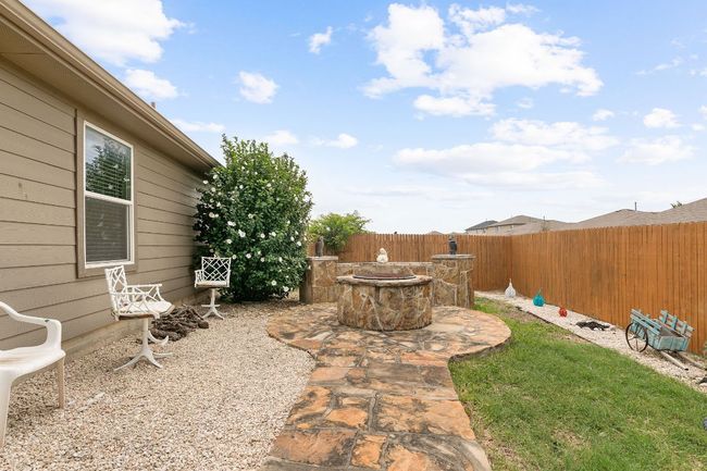 View of patio / terrace featuring a fenced backyard | Image 14