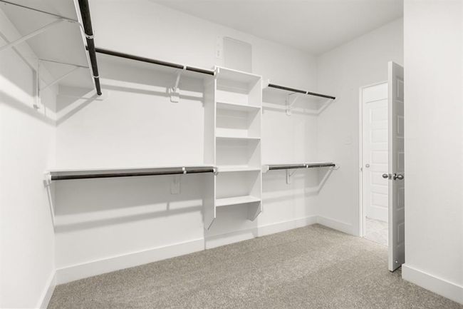 This closet is where your personal style flourishes, and every day starts with a little extra inspiration. Welcome to a space that feels not just like storage, but like a true extension of who you are. | Image 18