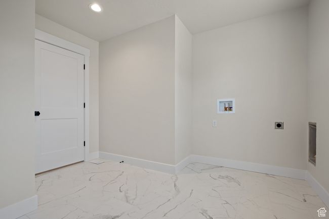 Washroom with electric dryer hookup, light marble finish floors, washer hookup, and recessed lighting | Image 29