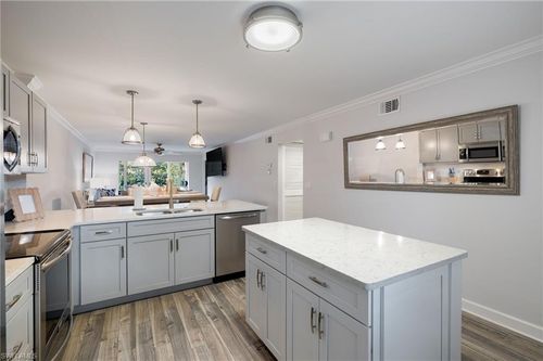 e106-3021 Sandpiper Bay Cir, NAPLES, FL, 34112-5674 | Card Image