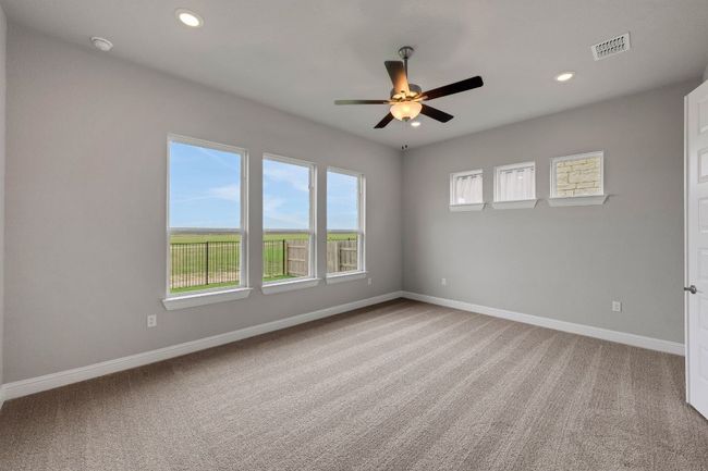 Unfurnished room featuring recessed lighting, a ceiling fan, and light colored carpet | Image 10