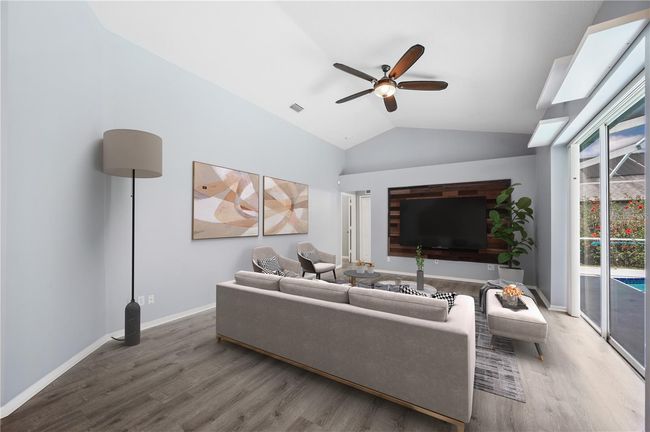 Grand room opening to pool | Image 11