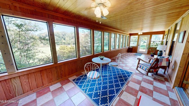 Large heated and cooled sunroom | Image 46