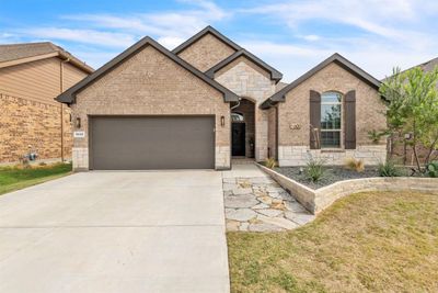 Stonework on Front Entry along with Flagstone walkway | Image 1