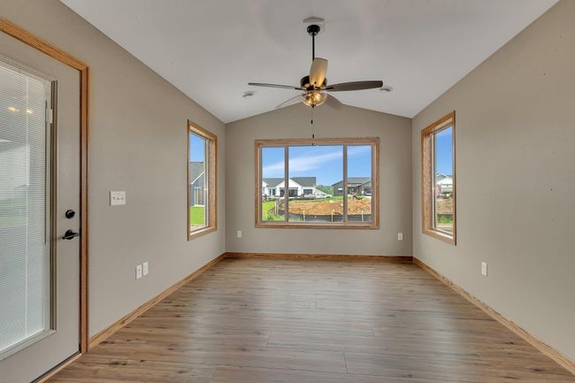 Sunroom walks out to concrete patio | Image 9