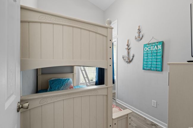Bedroom featuring vaulted ceiling and a ceiling fan | Image 33