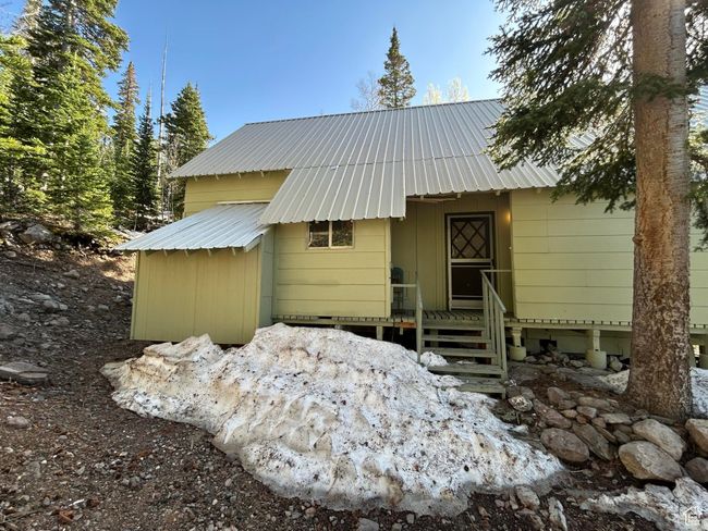 View of front of home with a metal roof | Image 39