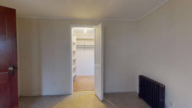 Hallway with radiator and ornamental molding | Image 16
