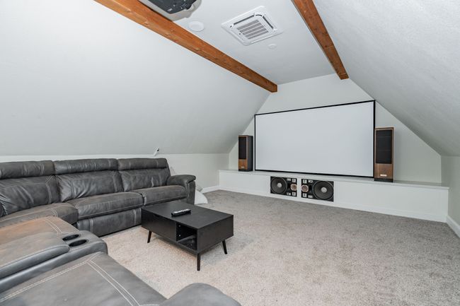 Home theater room over the garages | Image 16