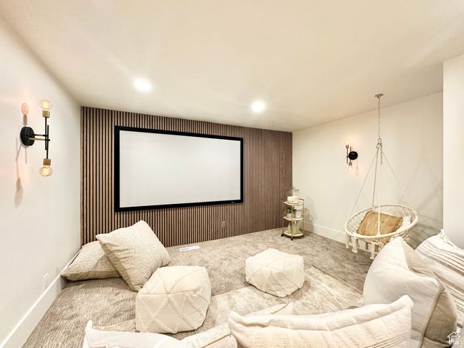 Home theater with carpet floors, recessed lighting, and an accent wall | Image 32