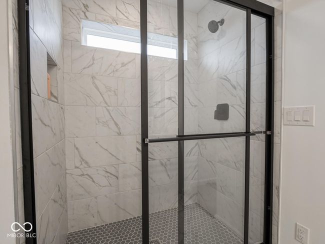 full bath featuring a stall shower | Image 40