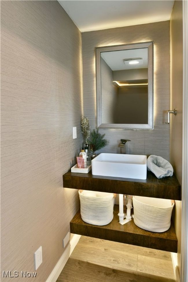 Bathroom featuring wood finished floors and a sink | Image 23