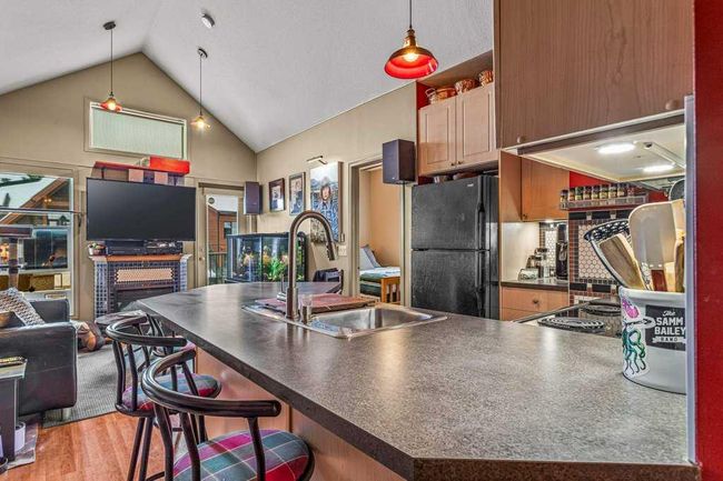 307 - 176 Kananaskis Way, Condo with 2 bedrooms, 1 bathrooms and 2 parking in Canmore AB | Image 10