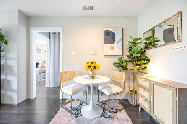 Enjoy your meals in this bright, cozy dining area. | Image 7