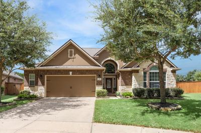 Gorgeous 3, 500 sf home with a stunning backyard! A Towne Lake Gem with all the bells and whistles, welcome home to 10031 Pecos River Bend. Impeccable home in a superb community located on a cul-de-sac lot! Recent roof - Southern Way Roofing - Class 4 impact resistant shingle with transferable buyer warranty in 2024. | Image 1