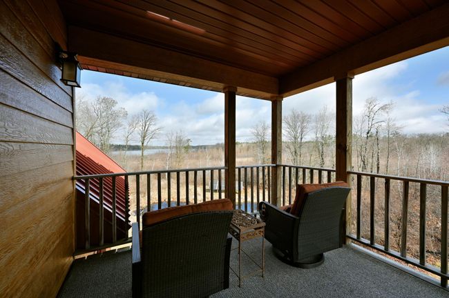 It has wonderful views of the property and lake. | Image 34