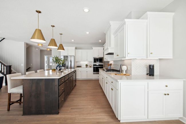 OneTenTen Homes Lanigan Isle at Amber Fields Savanna Model - 14.jpg | Image 4