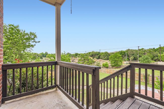 Wooden terrace featuring a yard | Image 24