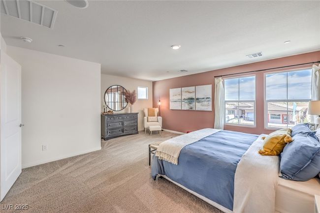 Bedroom featuring carpet floors and baseboards. Photo is representational only; actual home finishes may vary. | Image 23