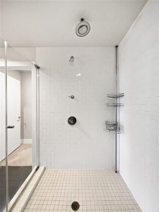 Bathroom featuring tiled shower | Image 21