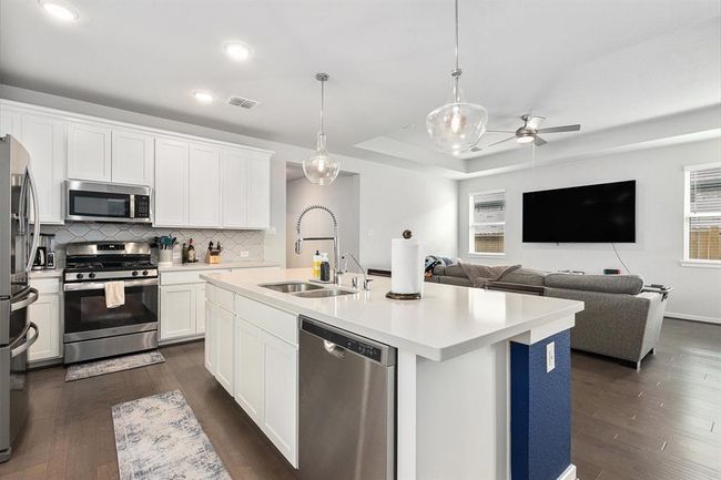 Cook, clean, and do the dishes all while able to watch your favorite shows! | Image 9