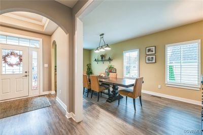 Foyer entrance featuring hardwood / wood-style flooring and crown molding | Image 3