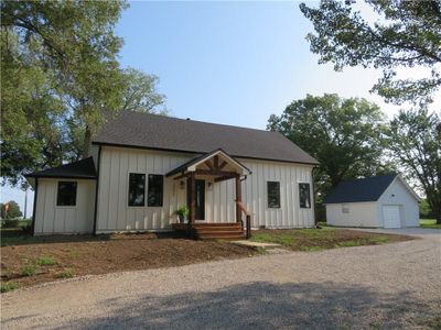 Modern farmhouse with detached garage, and covered porch! | Image 1