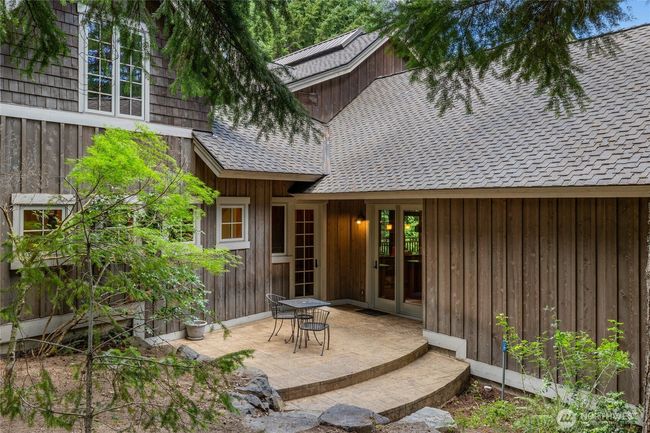 Cute bistro patio to enjoy your morning coffee just off the kitchen and primary bedroom. | Image 15