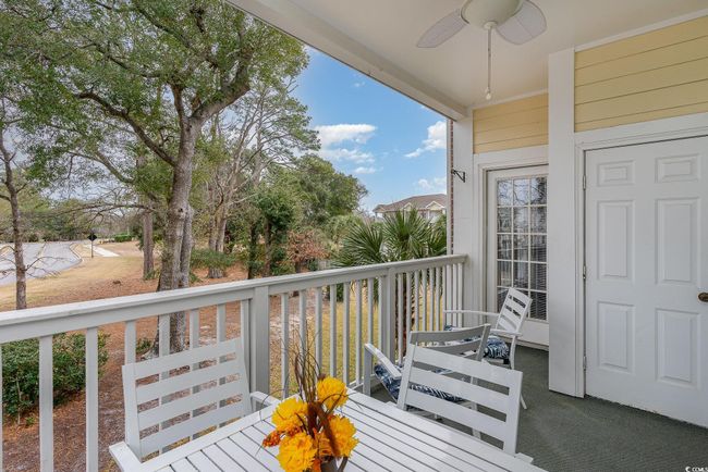 Balcony featuring ceiling fan | Image 17